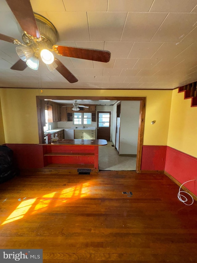 interior space featuring dark hardwood / wood-style floors and ceiling fan