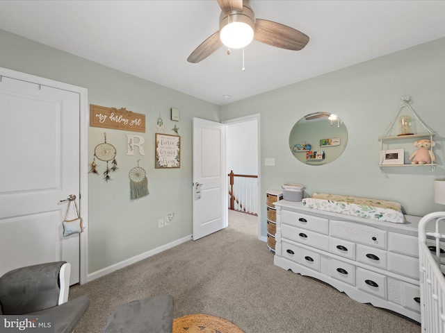 bedroom featuring ceiling fan and light colored carpet