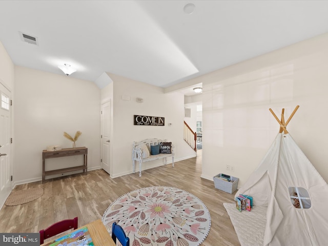 recreation room featuring light hardwood / wood-style flooring