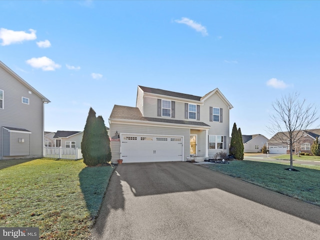 front facade with a garage and a front lawn