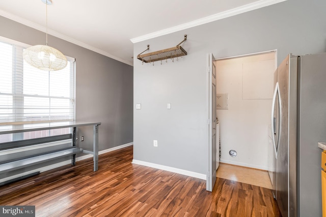 interior space with crown molding and dark hardwood / wood-style flooring