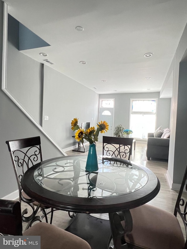 dining room with light hardwood / wood-style floors