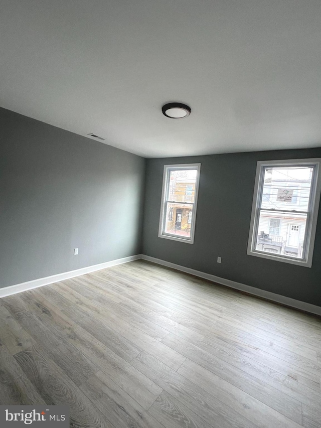 empty room featuring light hardwood / wood-style floors