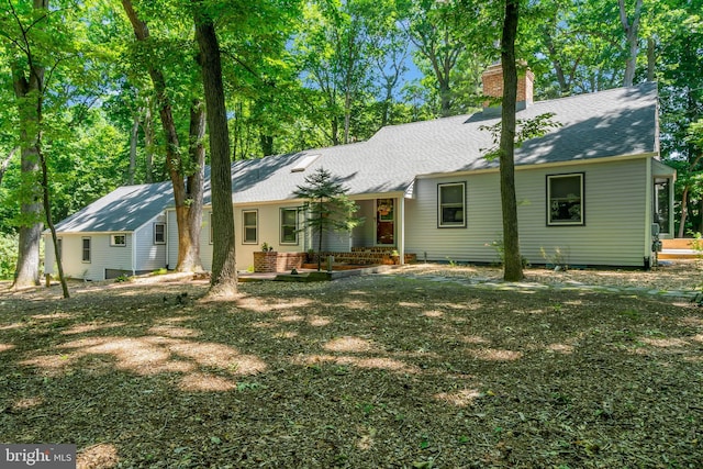 ranch-style house with a front lawn