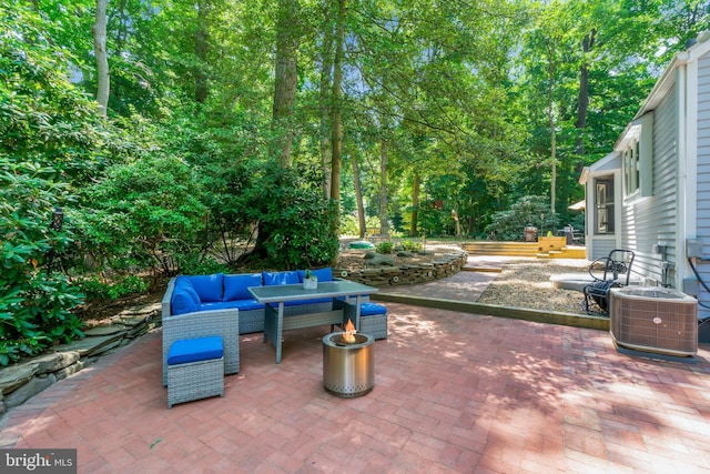 view of patio / terrace with central AC and an outdoor hangout area