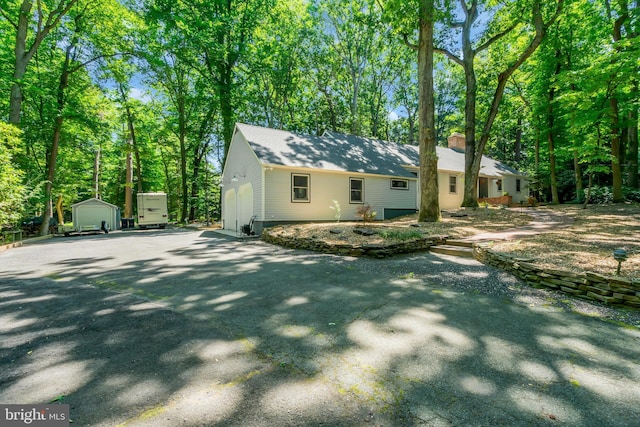 exterior space with a garage