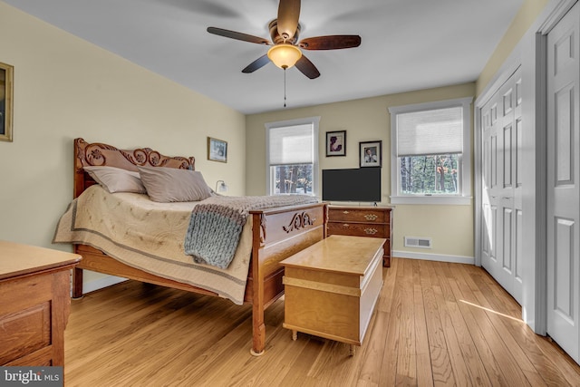 bedroom featuring ceiling fan and light wood-type flooring