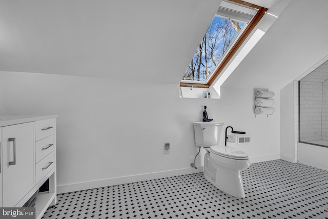 bathroom featuring toilet, lofted ceiling with skylight, and bathtub / shower combination