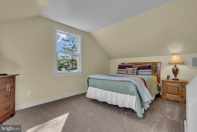 carpeted bedroom with vaulted ceiling