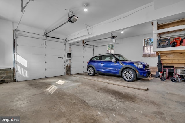 garage featuring a garage door opener