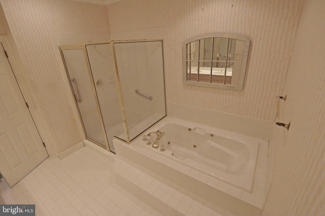 bathroom featuring tile patterned floors and plus walk in shower