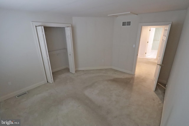 unfurnished bedroom with a closet