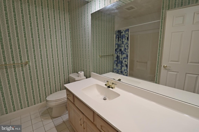 bathroom featuring tile patterned flooring, vanity, a shower with curtain, and toilet