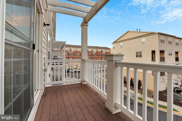 balcony featuring a pergola