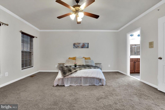 bedroom featuring carpet floors, ornamental molding, ceiling fan, and ensuite bathroom