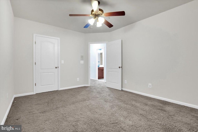 unfurnished bedroom featuring carpet and ceiling fan