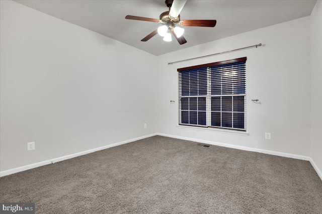 unfurnished room featuring ceiling fan and carpet flooring