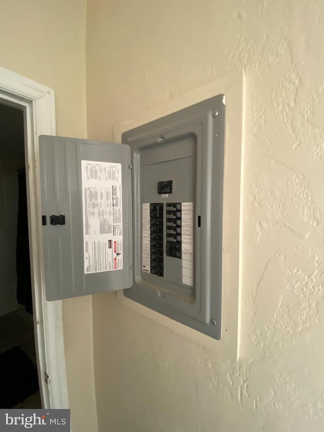 utility room featuring electric panel