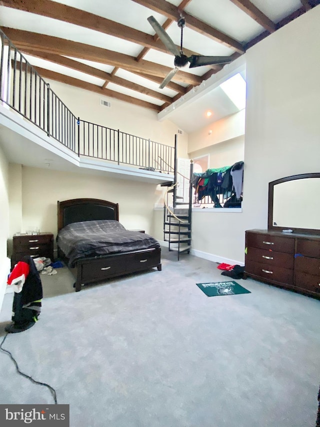 bedroom with vaulted ceiling with beams