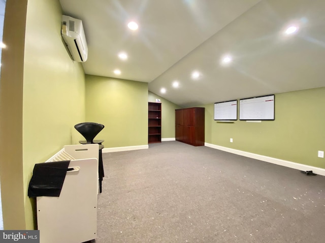 interior space with lofted ceiling and an AC wall unit