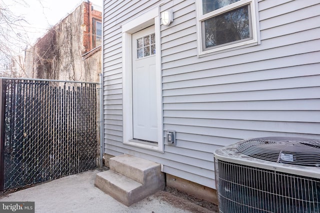 doorway to property with cooling unit