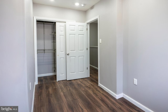 interior space featuring dark wood-type flooring