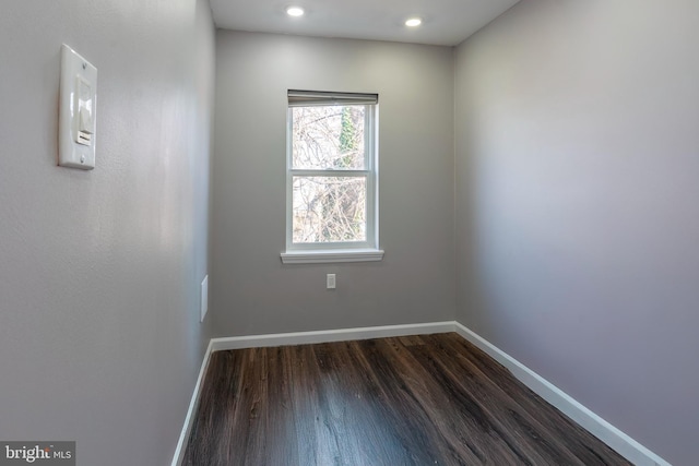 empty room featuring dark hardwood / wood-style floors