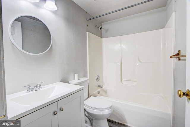 full bathroom featuring vanity, toilet, and tub / shower combination