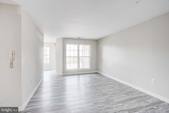 empty room with light wood-type flooring