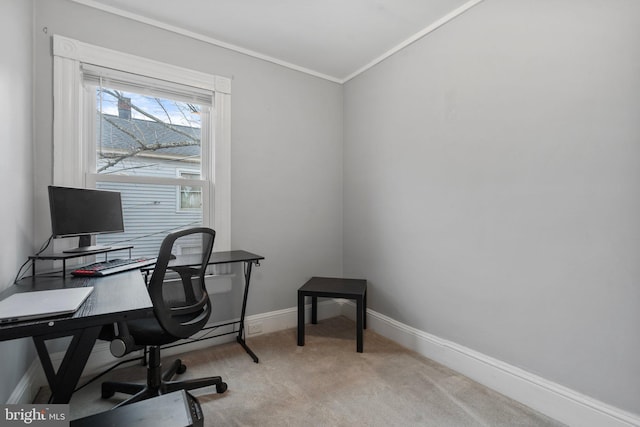 office area with light carpet and ornamental molding