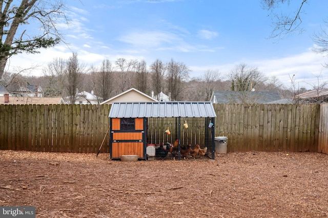 view of yard with an outdoor structure