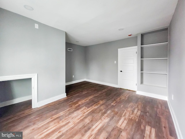 interior space with dark hardwood / wood-style floors