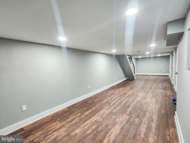 basement with wood-type flooring