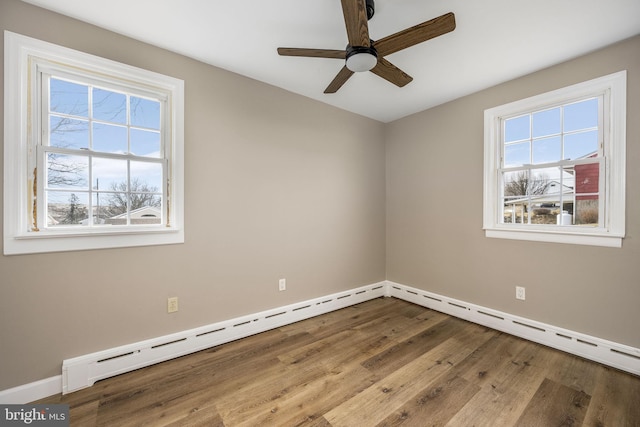 unfurnished room with ceiling fan and light wood-type flooring