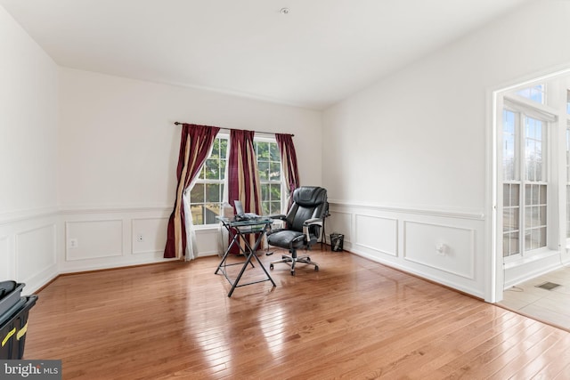 home office with light wood-type flooring