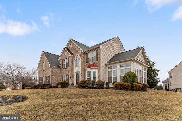 view of front of property with a front lawn