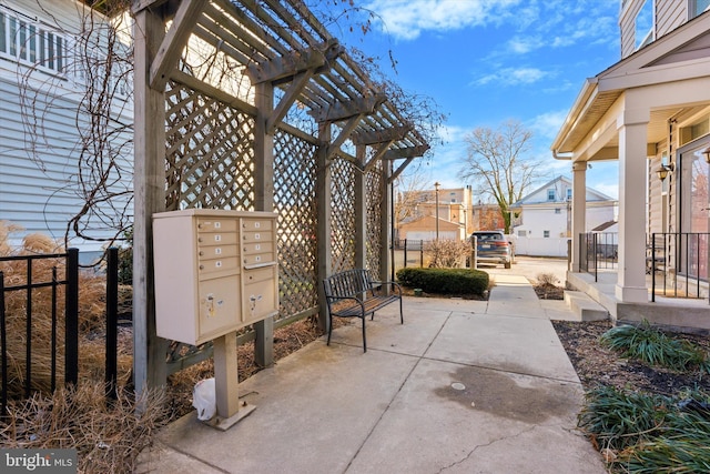 view of patio / terrace featuring a mail area