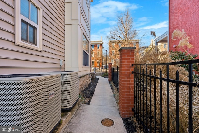 view of side of property with central AC unit