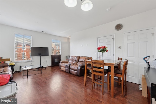 dining room with dark hardwood / wood-style floors