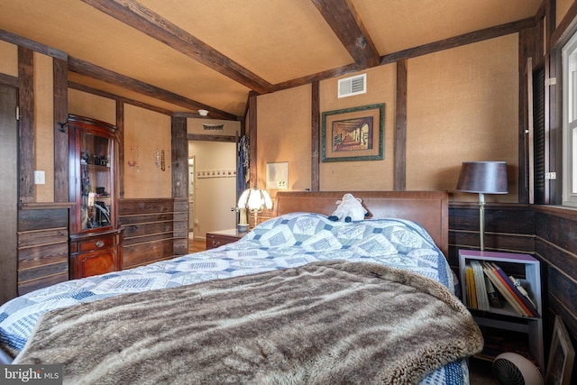 bedroom with beamed ceiling