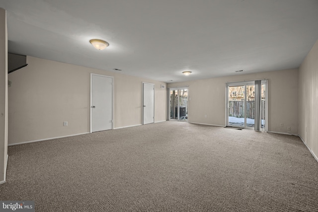 spare room featuring carpet flooring