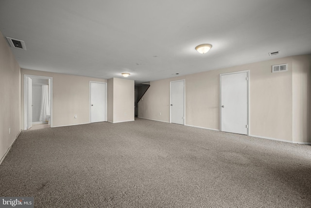 unfurnished room featuring carpet floors