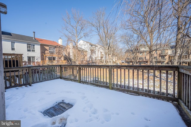 view of snow covered deck