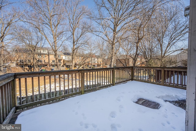 view of snow covered deck