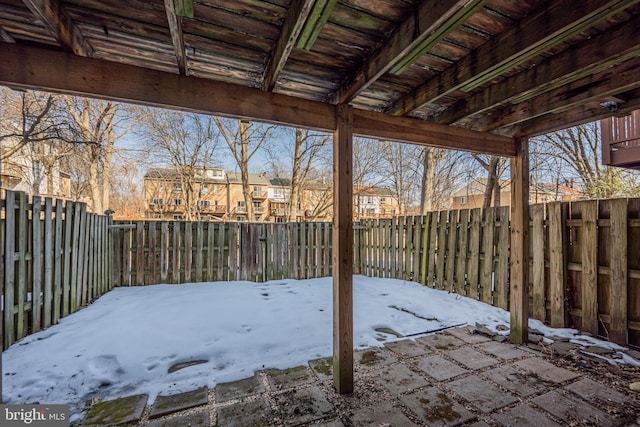 view of snow covered patio