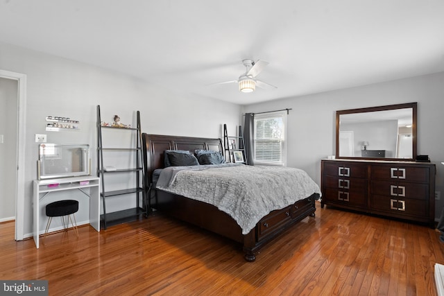 bedroom featuring hardwood / wood-style floors and ceiling fan