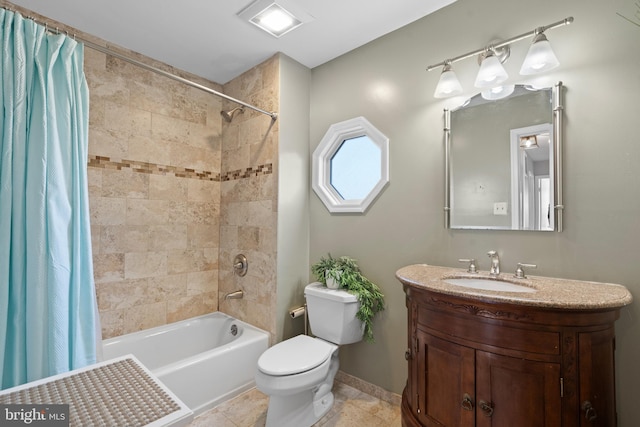 full bathroom with vanity, toilet, tile patterned flooring, and shower / bath combo