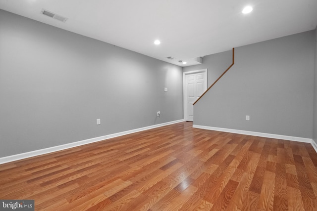 empty room with light hardwood / wood-style floors