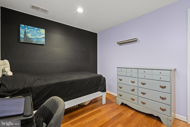 bedroom featuring light hardwood / wood-style flooring