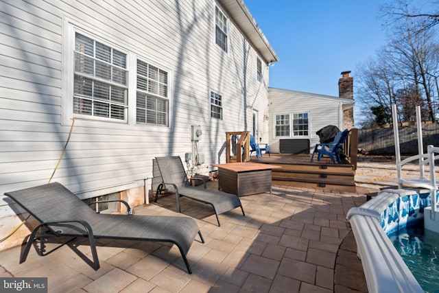 view of patio / terrace featuring a pool side deck